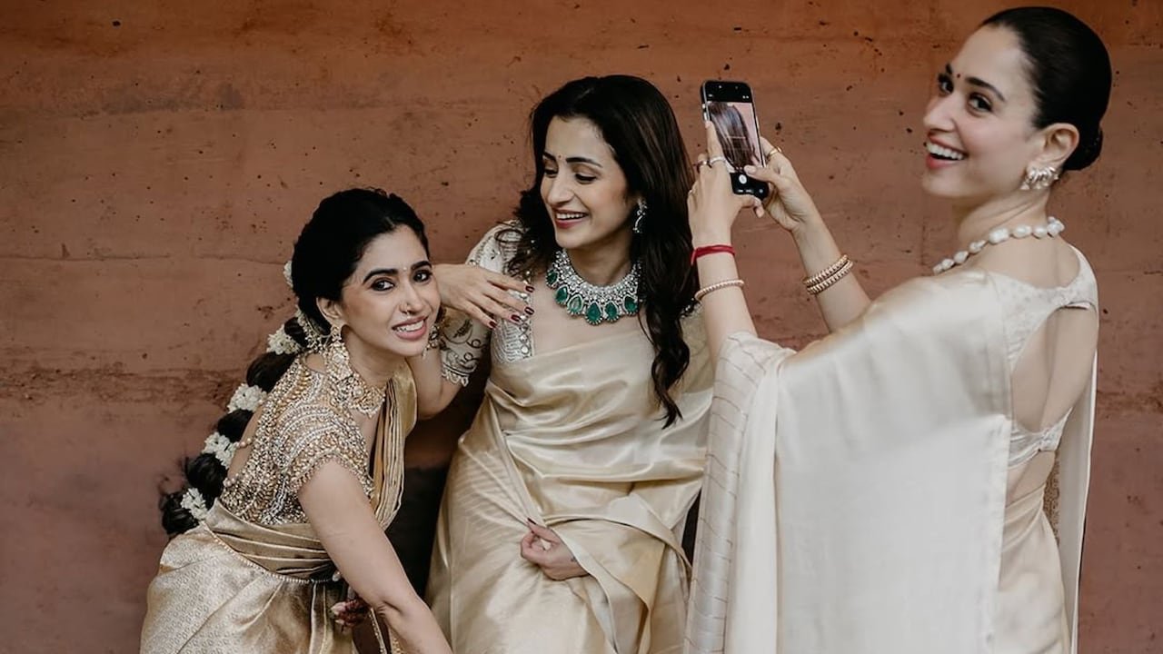 Tamannaah Bhatia Turns Photographer For Trisha Krishnan At Kushboo Sundar's Daughter's Wedding