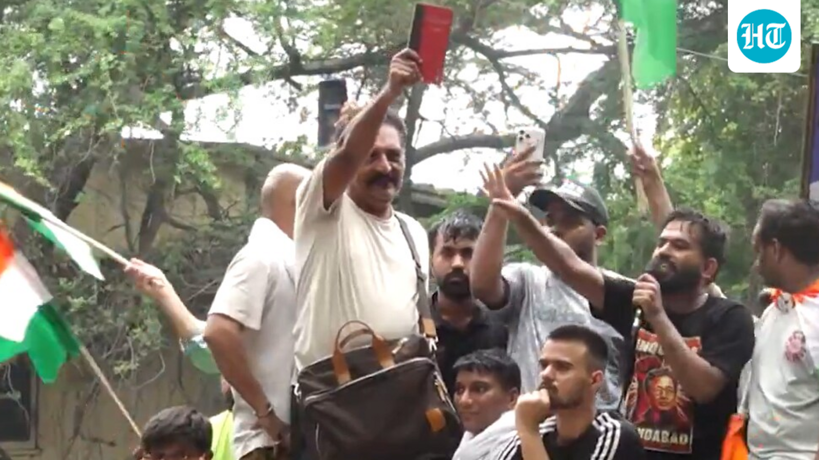 Prakash Raj waves the Indian Constitution at CJP's Chalo Sansad march in New Delhi. Watch