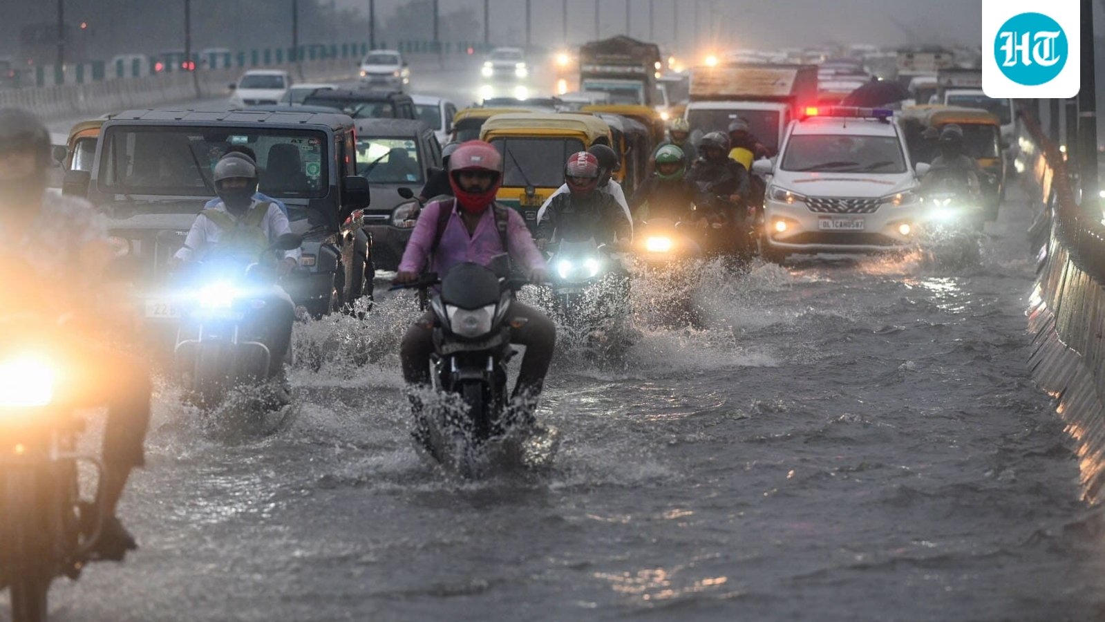 Rain, traffic and chaos: Delhi battles 'saavan ki baarish' as roads turn into rivers | In Pics