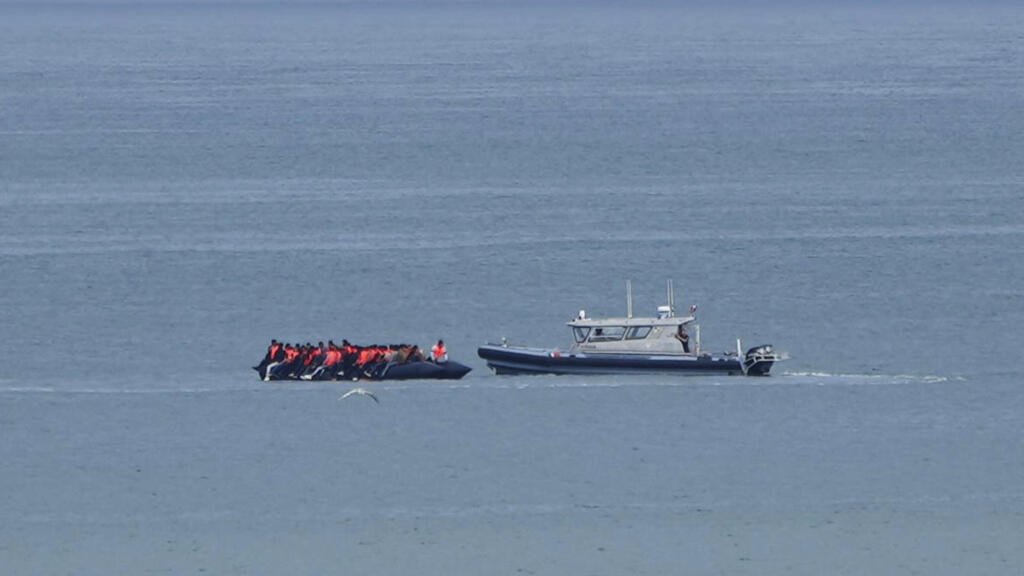 More than 150 migrants rescued after boat catches fire during Channel crossing