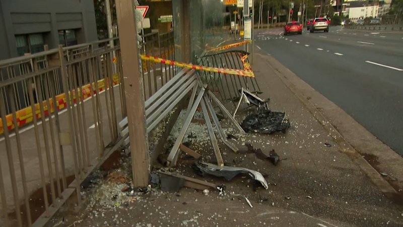 Woman charged after chaotic Sydney bus stop crash