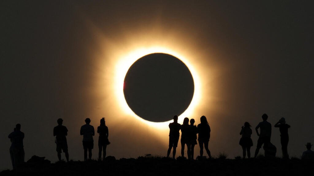 In pictures: Partial to total eclipse sweeps across much of Europe