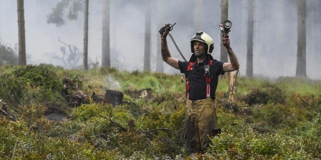 Belgian officials lift evacuation orders in wildfire zone