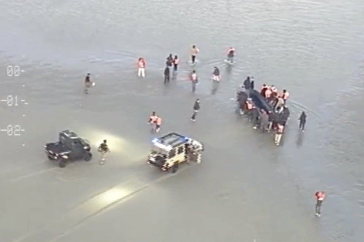 Footage shows migrants attacking French police trying to stop small boat crossing to UK