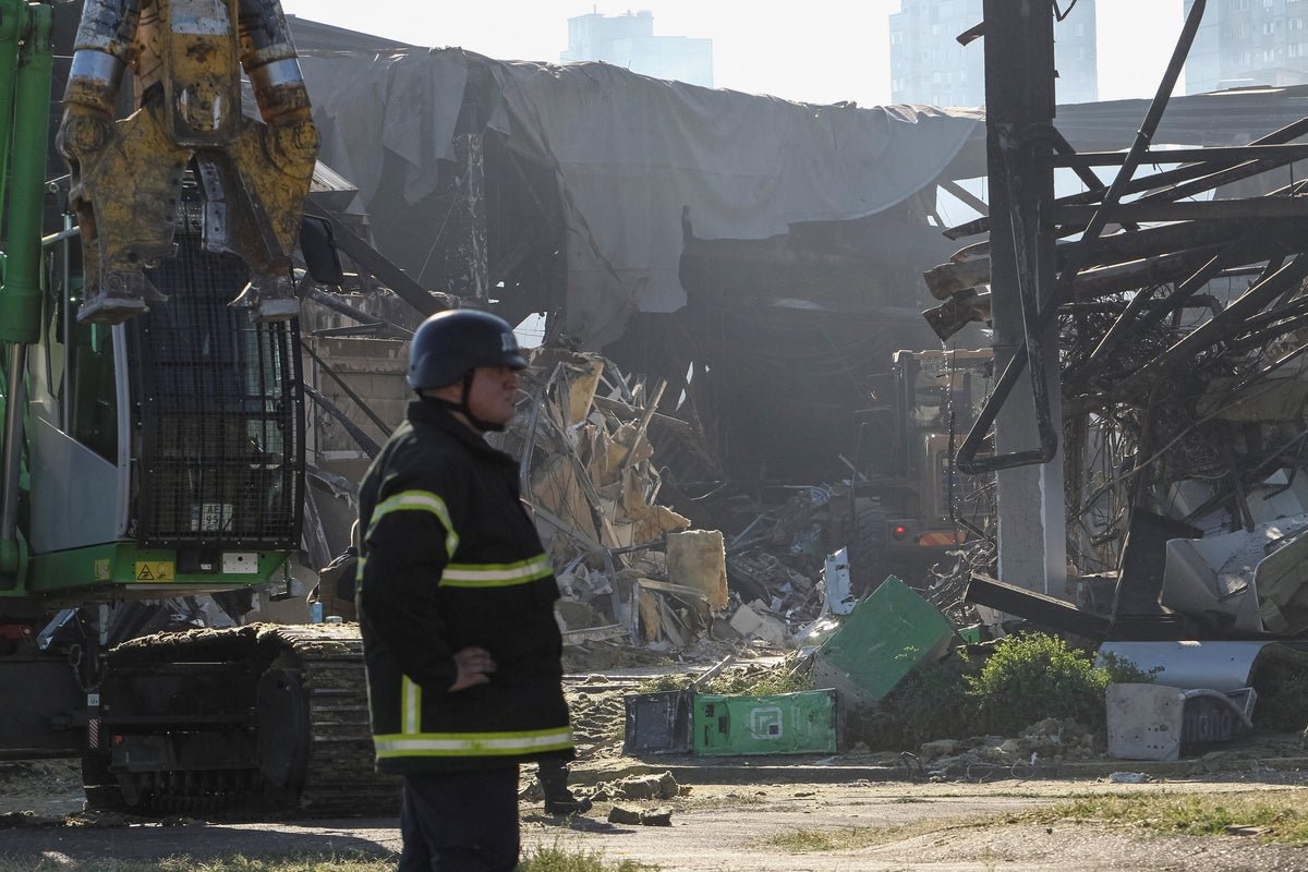 Zelensky vows revenge after Russian double-tap strike on shopping mall in his hometown kills 16