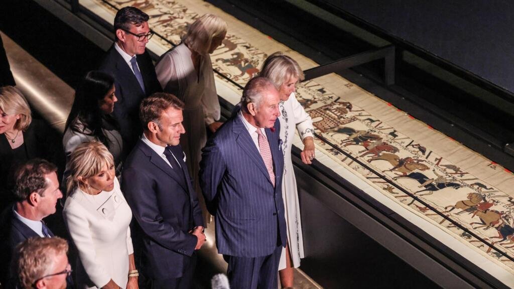 Macron urges France, UK to forge closer bond as Bayeux Tapestry goes on display in Britain