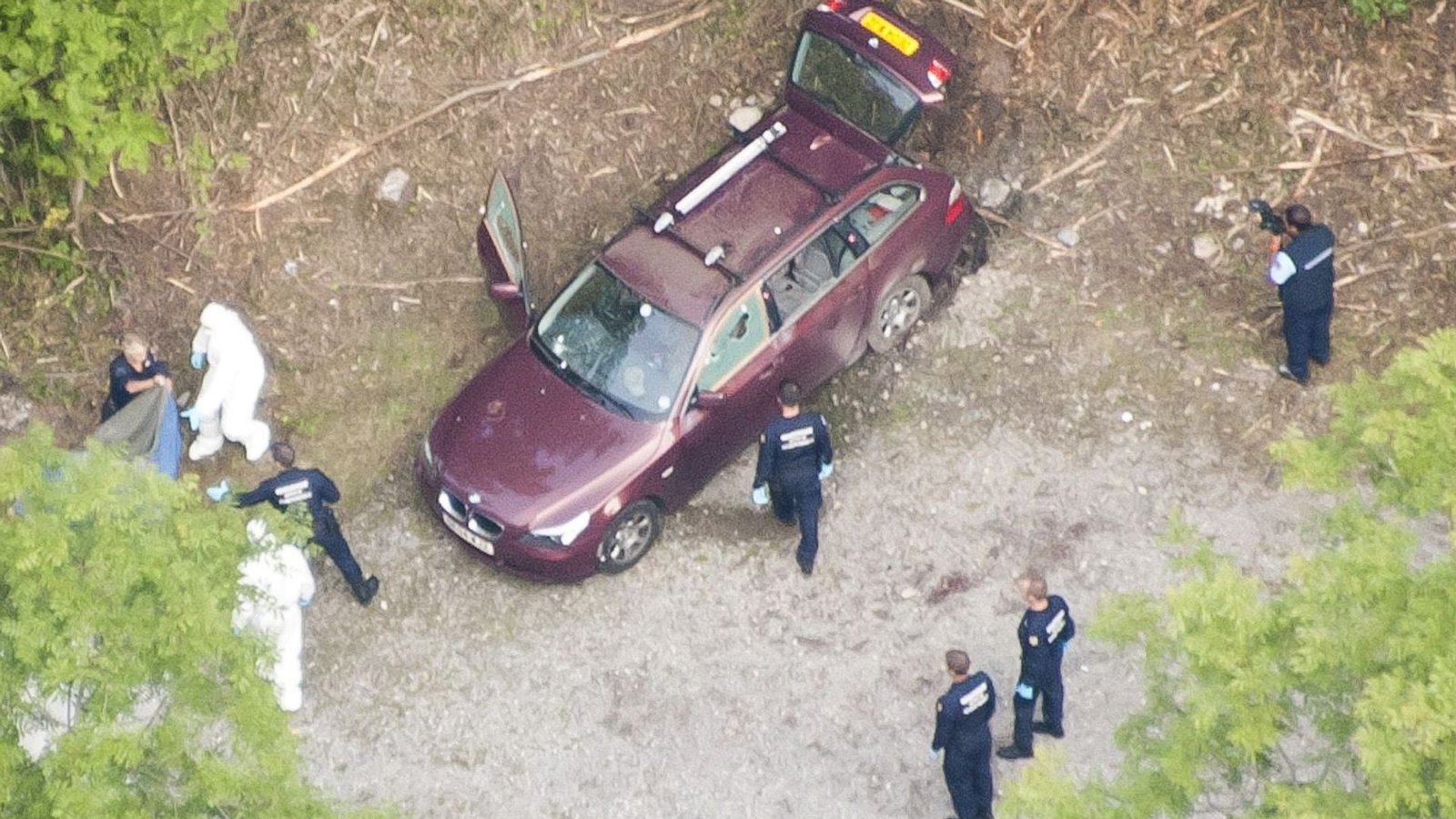 Pistol in lake could be linked to unsolved killings of British family