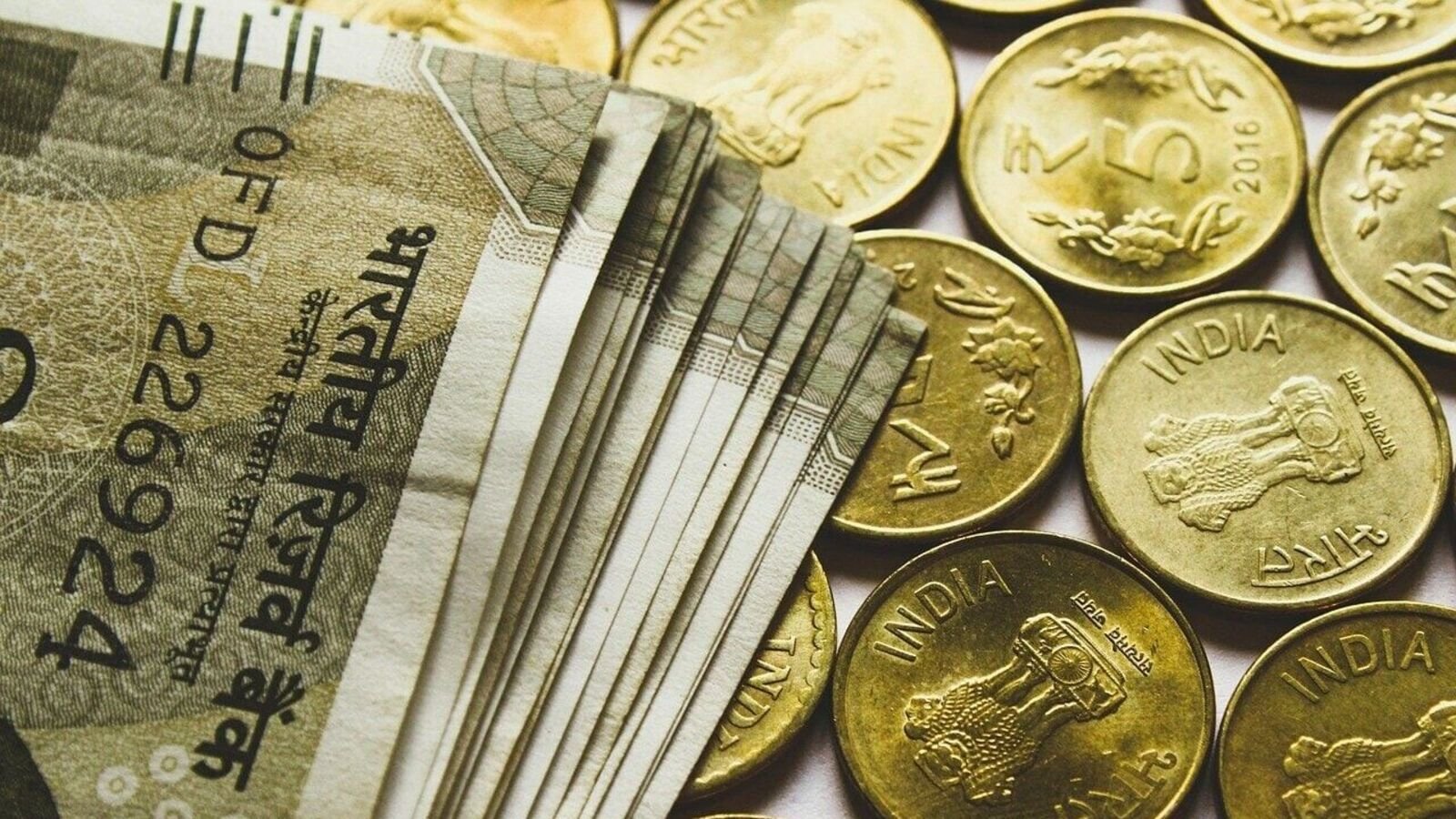 Rupee opens 10 paise higher at 94.39 against US dollar