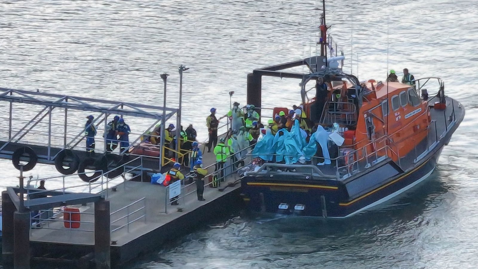 Police dispersal order in place after small boat arrival sparks protests