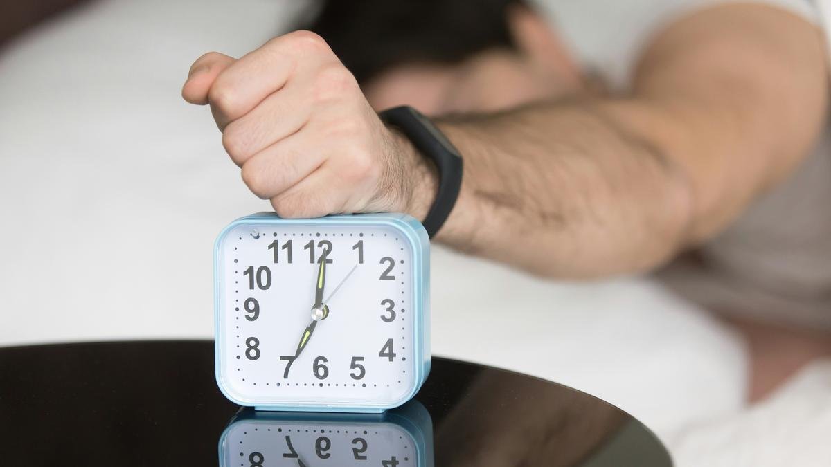 Why do we sometimes wake up a few minutes before our alarm rings?