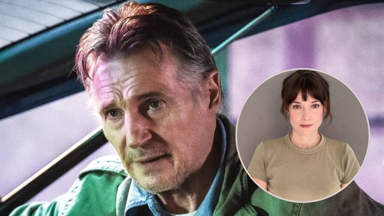 Liam Neeson and Stella Stocker hold hands at the TIFF red carpet