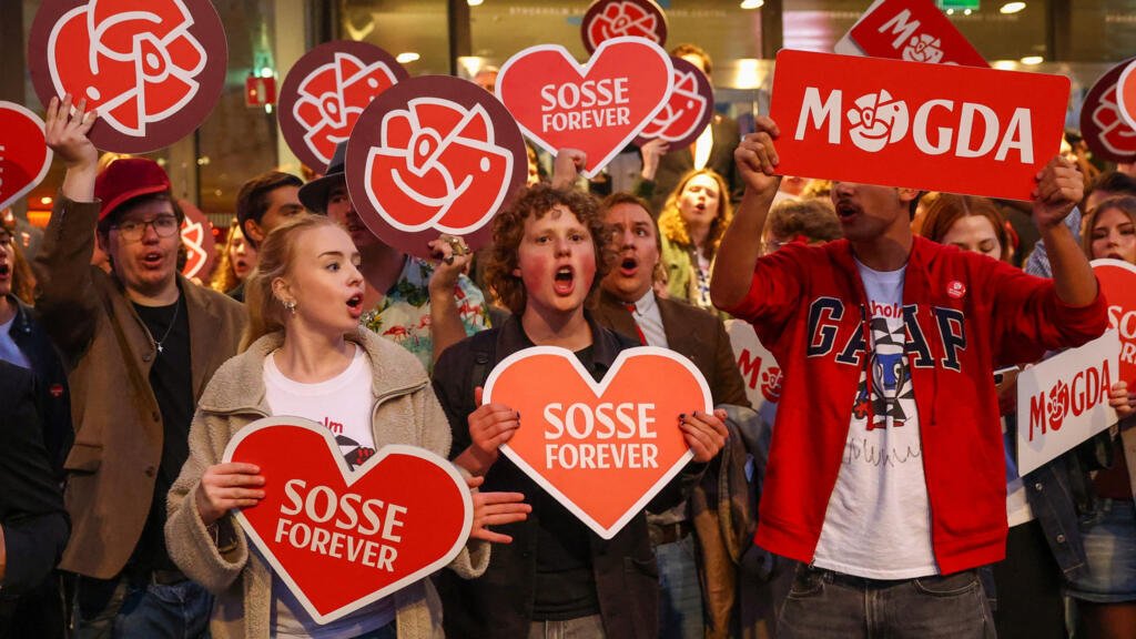Sweden's centre-left holds razor-thin edge as exit polls show tight race